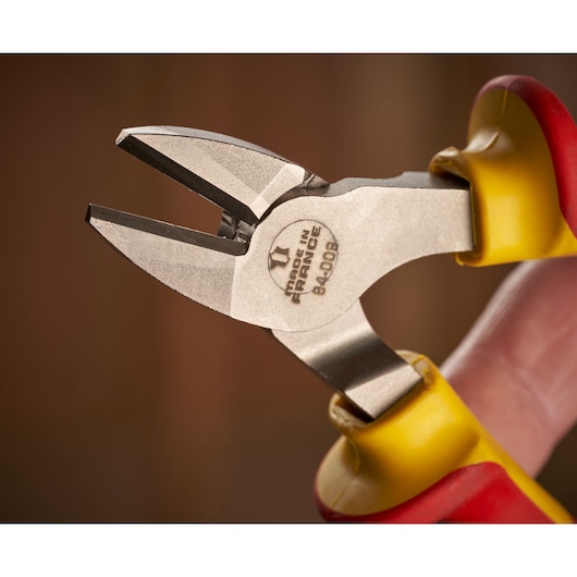 STANLEY 0-84-009 insulated diagonal cutting pliers close-up, yellow and red handles, product photography.