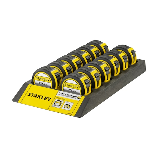 STANLEY 1-30-696 tape measures in yellow-black, angled front view, organized on display tray.