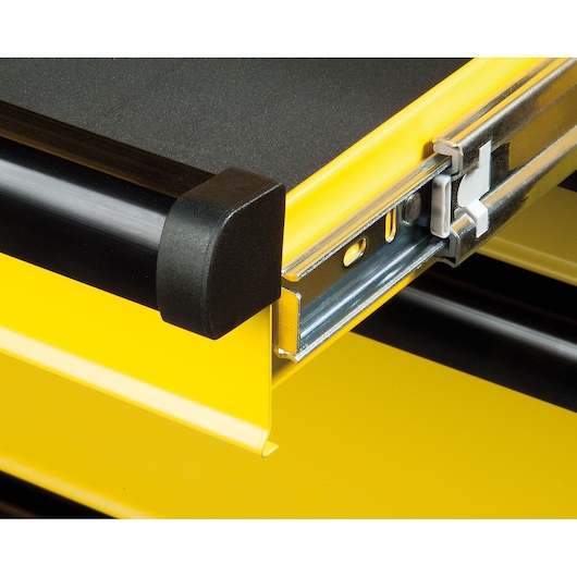 STANLEY FMHT0-74027 drawer slide close-up, yellow metal frame with black protective corner, photography, angled view.