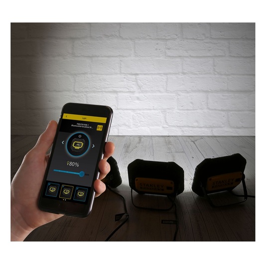 STANLEY FMHT81508-1 work lights controlled by smartphone app, front angle photography.