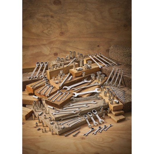 STANLEY FMMT13036-0 photography of assorted metal wrenches and sockets displayed on wooden blocks.