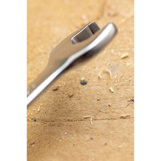 STANLEY FMMT13089-0 wrench close-up on wooden surface, metallic finish, photography category.