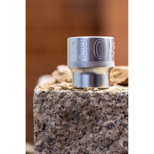 STANLEY FMMT82684-1 silver socket, 30mm, close-up on stone surface, tool photography.
