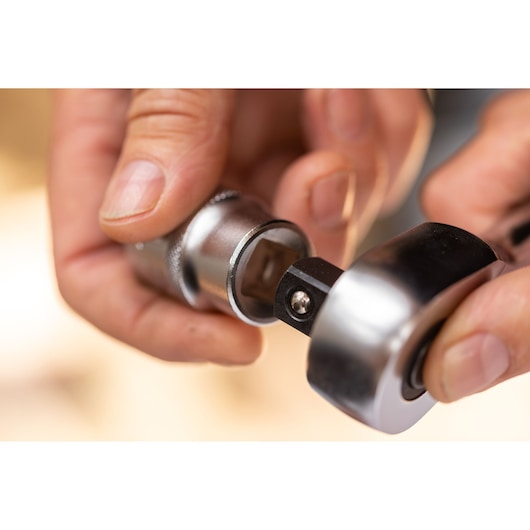 STANLEY FMMT82826-1 socket wrench attachment in use, close-up photo showing metallic tool details.
