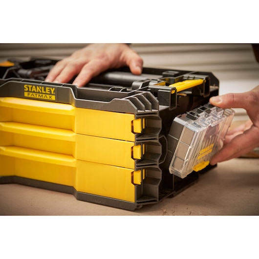 STANLEY FMMT98107-1 yellow and black tool organizer with removable transparent compartment, side angle.