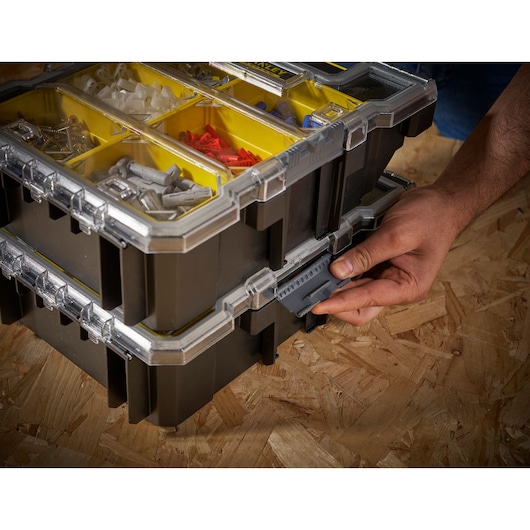 STANLEY FMST1-72378 organizer photo, stacked black and yellow boxes with clear lids and compartments.