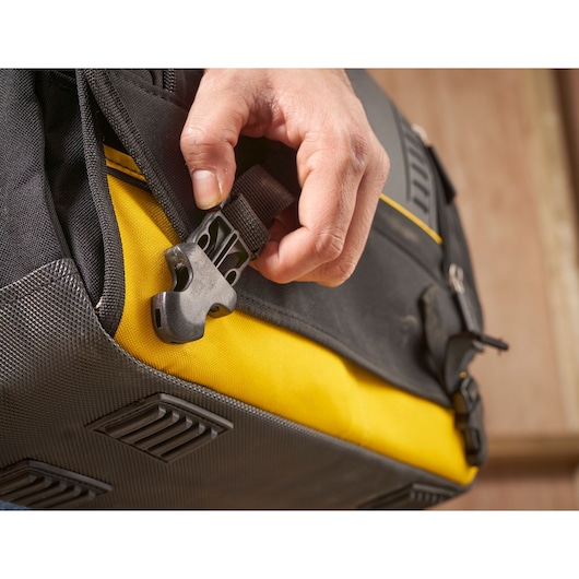 STANLEY FMST1-80149 tool bag close-up showing black buckle and yellow fabric detail.