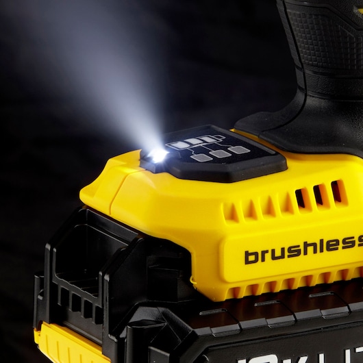 STANLEY KFMCF647D2K cordless brushless tool close-up showing LED work light on, black and yellow design.