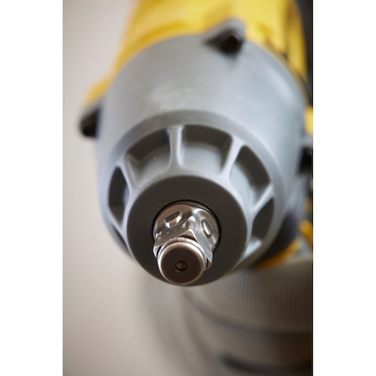 STANLEY SFMCF900B impact wrench front close-up, showing metal anvil and grey casing, photography on white.