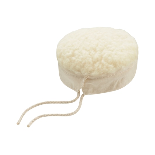 STANLEY STA32122-XJ photography of round beige wool applicator pad with tie strings, front angle.