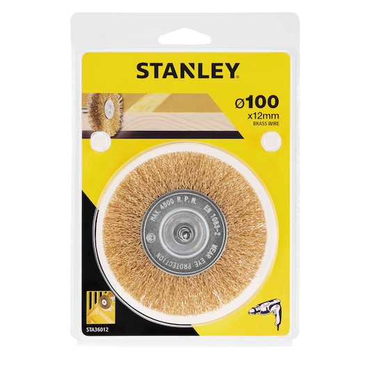 Photo of STANLEY STA36012 brass wire wheel brush, 100mm x 12mm, packaged on yellow card, front view.