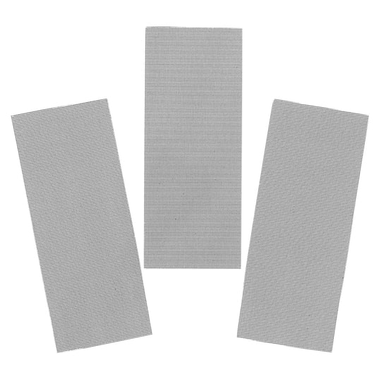 Photo of three rectangular STANLEY STA39062 sanding mesh sheets, black grid pattern, top view on white background.