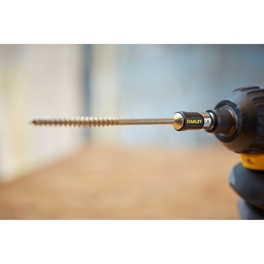 STANLEY STA88566 drill bit holder with screw attached, close-up photography on power drill.