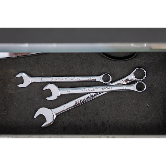 STANLEY STMT95909-0 combination wrenches in silver, top view, placed inside a tool drawer.