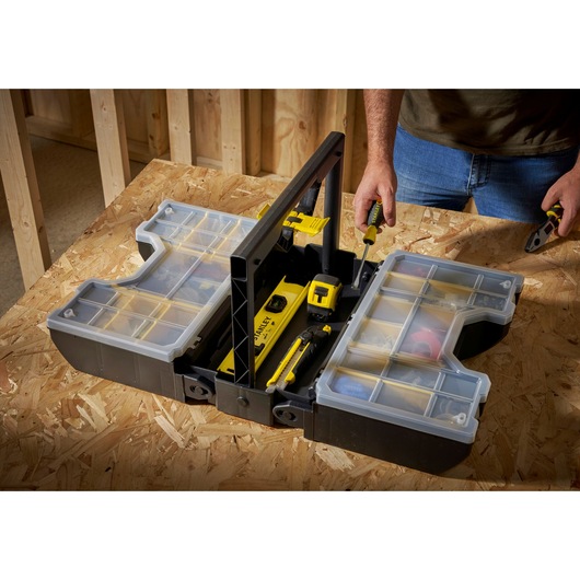STANLEY STST1-71963 portable organizer with clear lid compartments on workbench, tools inside, top view