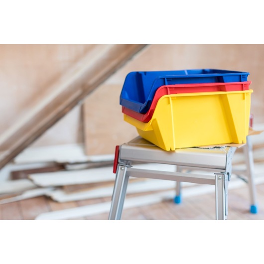 STANLEY STST82714-1 stackable storage bins, yellow, red, blue, photographed on metal step stool.